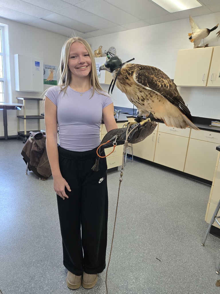 🦅 What an amazing experience for our students!  We were excited to welcome Steve Kaufer back again this year to share his falconry expertise with Mrs. Klecker’s Biology classes. Steve and his daughter Bethany, now an 11th grader, brought in two incredible birds and a whole lot of knowledge and passion.  Steve talked with students about the history of falconry, how he first became interested, the unique skills and adaptations of different birds of prey, and how important these birds are to keeping ecosystems in balance. He also shared how falconry has become something special he gets to do with his family.  Students had the chance to meet Merida, a Red Tailed Hawk and Bethany’s bird, along with a Merlin, and learn how their different traits help them survive in the wild. Some students even got to hold the birds, which made the experience even more memorable. We also had students from Ms. Sara White’s Room 220 join in on the fun.  A big thank you to Steve and Bethany for another fantastic visit. If you want to see more of their falconry adventures, you can follow Steve on Instagram at sun_flower_steve.