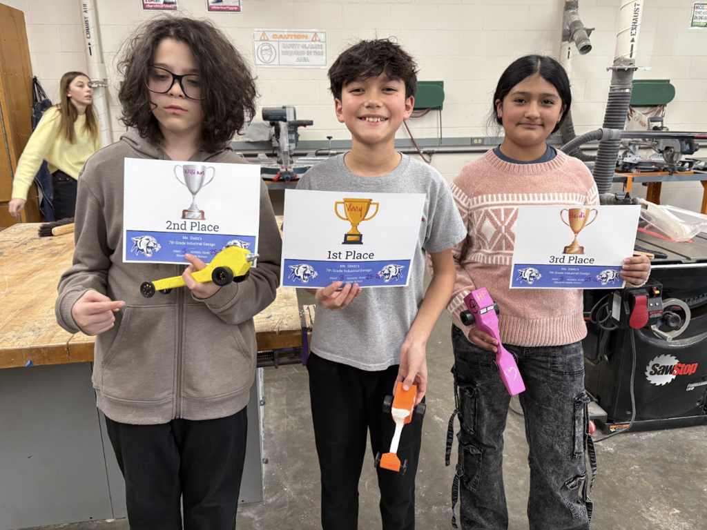 🏁💨 7th Grade Industrial Tech = Fast & Focused! 💨🏁  Ms. Steitz’s 7th grade Industrial Tech students put their skills to the test by designing and building their very own CO₂ cars. From start to finish, students worked on the band saw, drill press, and sanding their designs to get them race-ready.  Then it was time to see whose car had the need for speed! Going head-to-head in a tournament-style bracket, races were so close that some were decided by the thousandth of a second. Talk about intense!  🏆 Congratulations to our top finishers: 🥇 Vinny E – 1st Place 🥈 William K – 2nd Place 🥉 Heidi P – 3rd Place  Great work to all of our 7th graders for combining design, precision, and a little friendly competition. Panther Pride in action! 💜🖤 #PantherPride