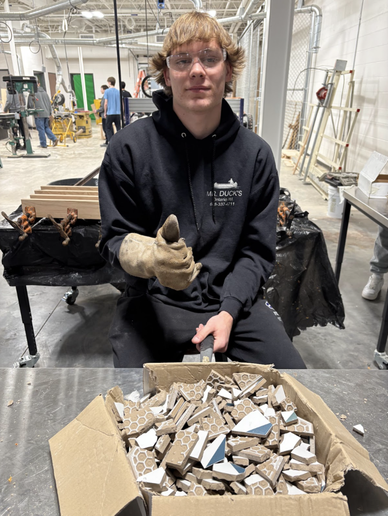 📐🧱 Math You Can Actually See! 🧱📐  Ms. Steitz’s and Mrs. Marson’s Math for the Trades class has been busy turning math into something hands-on and beautiful. Thanks to the generosity of H&F Flooring and Home Design, students received donated tile to create their own mosaic-tiled tables.  While designing their projects, students practiced real-world skills like mixing materials in proper ratios by volume, estimating area, and applying math concepts in a practical setting. It’s one thing to solve a problem on paper and another to bring it to life with your own hands.  We are so grateful to our community partners for supporting our students and helping make learning meaningful. Panther Pride in action! 💜🖤 #PantherPride