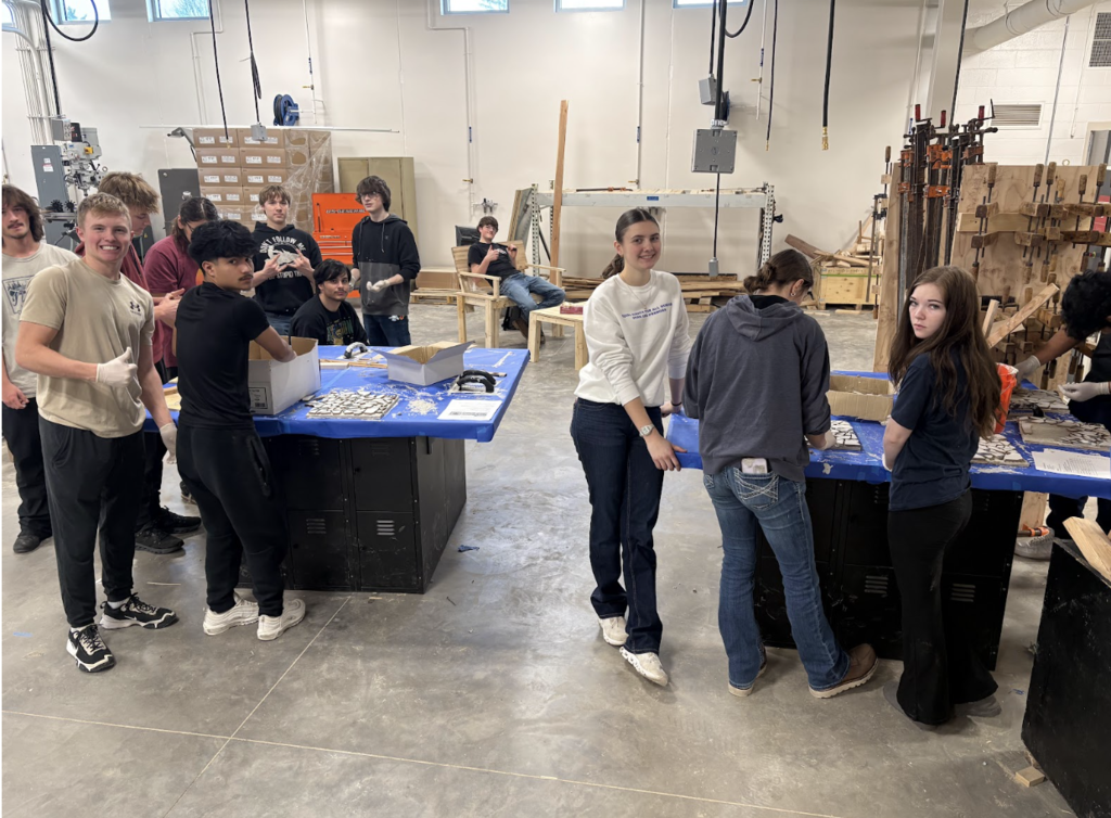 📐🧱 Math You Can Actually See! 🧱📐  Ms. Steitz’s and Mrs. Marson’s Math for the Trades class has been busy turning math into something hands-on and beautiful. Thanks to the generosity of H&F Flooring and Home Design, students received donated tile to create their own mosaic-tiled tables.  While designing their projects, students practiced real-world skills like mixing materials in proper ratios by volume, estimating area, and applying math concepts in a practical setting. It’s one thing to solve a problem on paper and another to bring it to life with your own hands.  We are so grateful to our community partners for supporting our students and helping make learning meaningful. Panther Pride in action! 💜🖤 #PantherPride