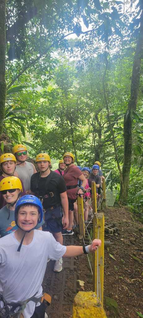 What an incredible spring break adventure for our Ellsworth High School International Club! ✈️🌎  A group of 33 EHS students and chaperones traveled to Costa Rica and Panama, experiencing the culture, food, and natural beauty of both countries while making memories that will last a lifetime.  Along the way, students had the chance to: 🌴 Zip line through the rainforest 🤿 Snorkel in the Pacific Ocean 🛶 Kayak near La Fortuna, Costa Rica 💦 Climb the 500+ steps to see the beautiful La Fortuna waterfall  In Panama, the adventure continued with: 🏄 Surfing lessons 🚤 Boating on Lake Gatun 🚢 Watching the Panama Canal in action  Students also enjoyed incredible local food and learned about the region’s culture and businesses, including a visit to a cocoa bean plantation.  It was an unforgettable experience filled with learning, exploration, and plenty of fun. Thank you to everyone who helped make this trip possible! 💜🖤 #PantherPride