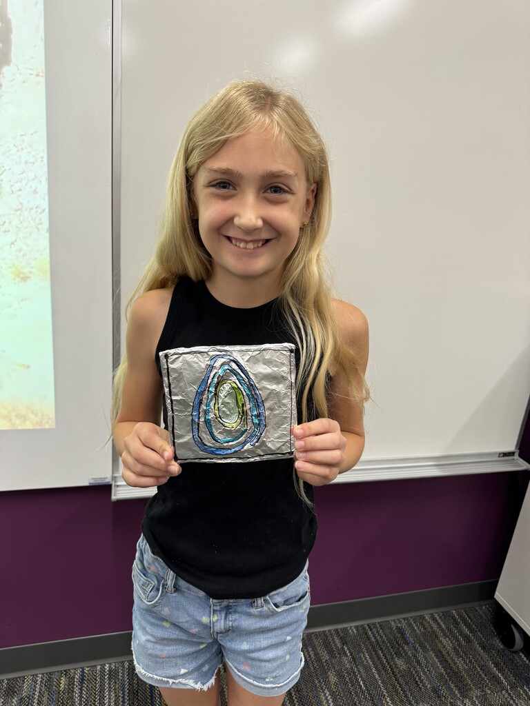 🎨✨ Creativity from around the world came to life in Ms. Asmus' summer school classroom!  Students recently completed beautiful art projects inspired by the intricate silver jewelry and designs of the North African Amazigh people. Through this Mediterranean Folk Art lesson, students explored another culture while creating their own unique masterpieces using bold patterns, shapes, and metallic details.  Take a look at these amazing finished projects. Great job, everyone! 👏🌍🖌️