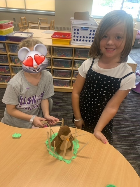 Mrs. Foley’s kindergarten class has been learning what it means to be respectful, responsible learners at EES, and one important part of that is cooperation!  The kinders put their teamwork skills to the test by working together to build “cages” for their animals using only sticks and Play-Doh. 🐯🦁🐻  They did a great job working together, sharing ideas, and getting creative! Way to go, kinders! 💜🐾