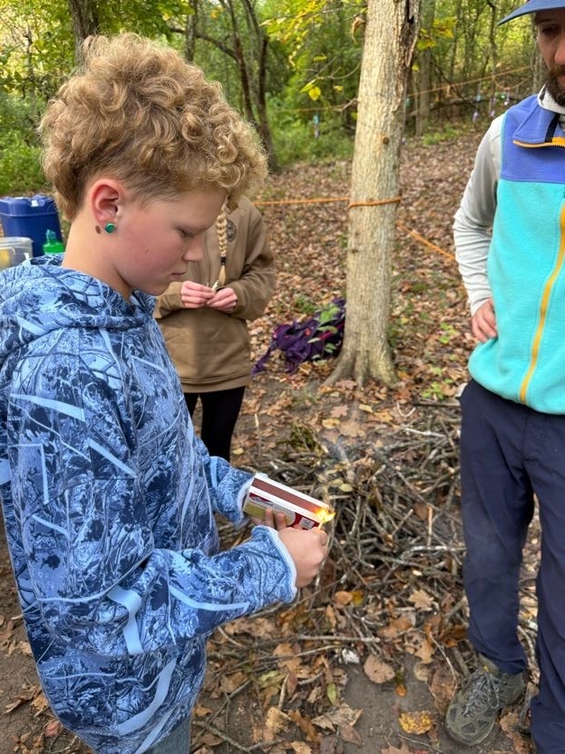 🔥🌲 Learning Outside the Classroom! 🌲🔥  Our 5th graders recently enjoyed an awesome outdoor adventure with Red Wing ELC!  Students had several activities to choose from, including outdoor cookery, fishing at the Alma Float, rock climbing, outdoor photography, and canoeing. 🎣🧗📸🛶  During outdoor cookery, students learned how to safely gather wood and start a fire with supervision. Then came the tasty part! They cooked over an open campfire, making bannock (pancakes with cornmeal), ham and cheese pudgie pies, pizza quesadillas, and banana boats. 🔥🍌  What a great opportunity for our students to get outside, try something new, learn some hands-on skills, and make memories with their classmates!  A big thank you to Red Wing ELC for providing such a fun and memorable experience for our 5th graders! 💜