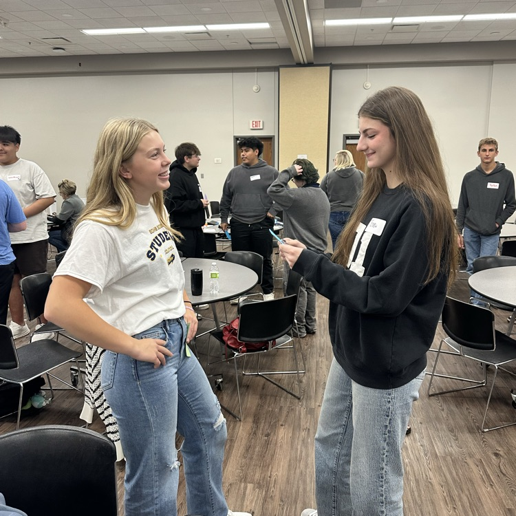 Chelsea Kottich conversing 