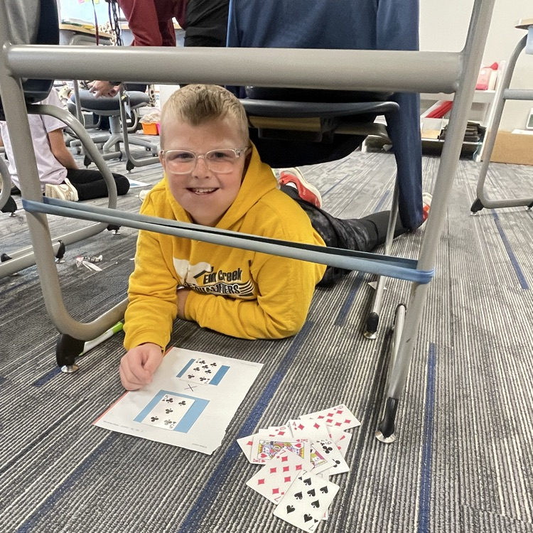 3rd grader playing a math game