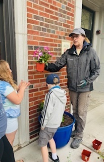 Students planting flowers