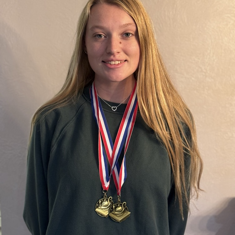 Addi with her medals.