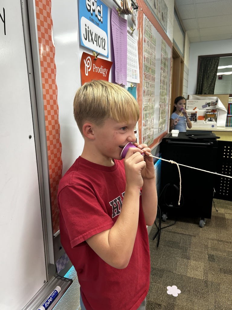 Cup telephones in action! 