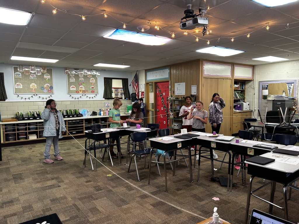 Cup telephones in action! 