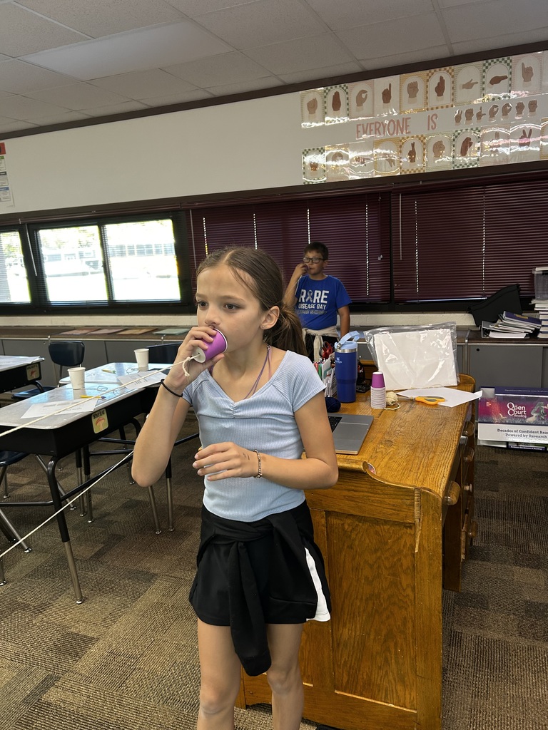 Cup telephones in action! 