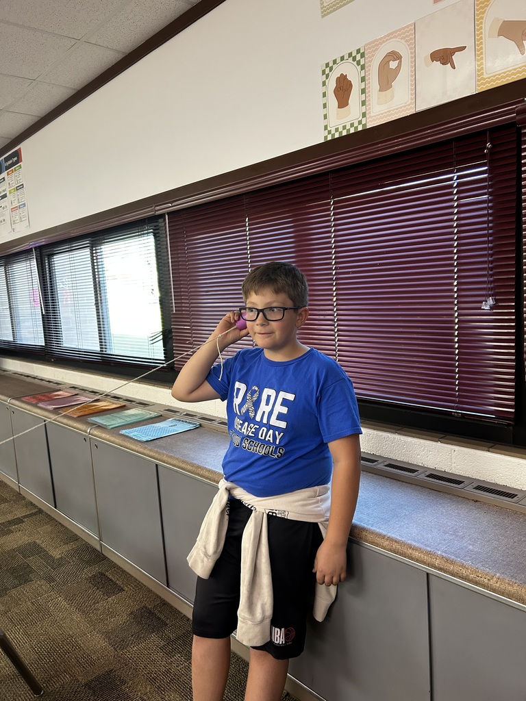 Cup telephones in action! 