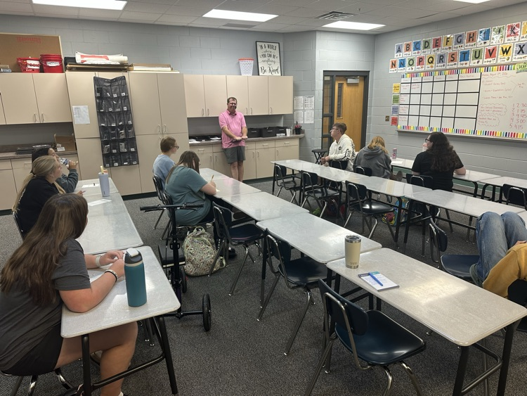 Cody Gerlach presenting to students