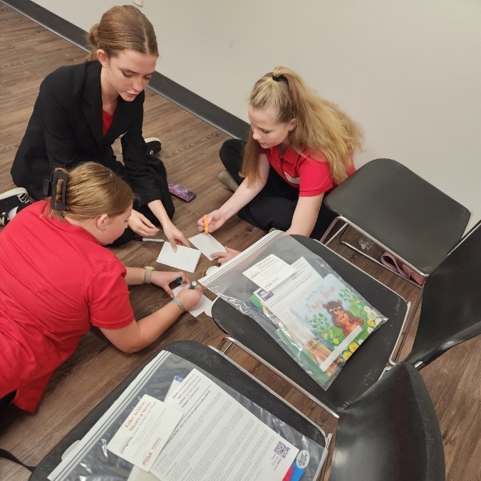 Making reading kits as a community service project.