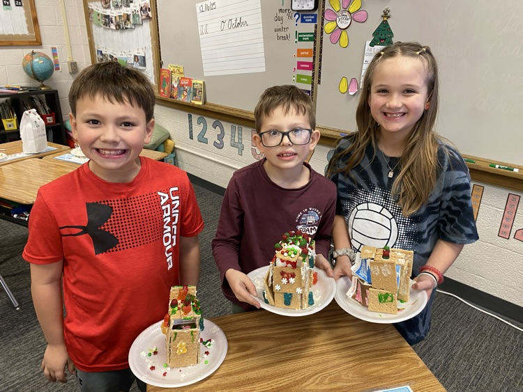 2nd grade students with gingerbread houses