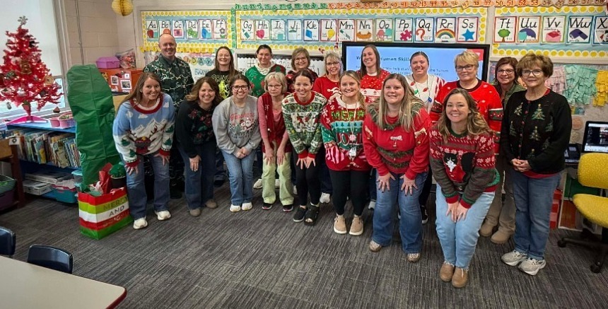 staff wearing ugly sweaters