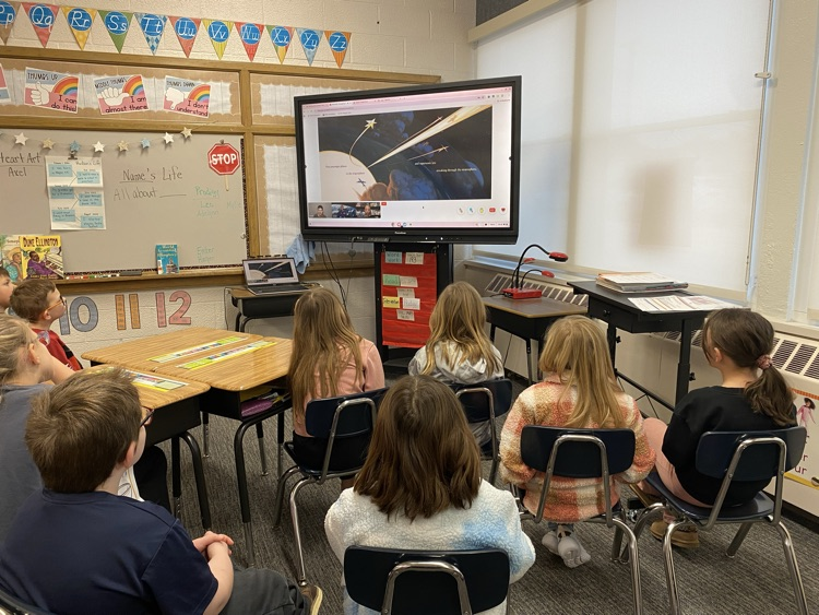 students listening to book