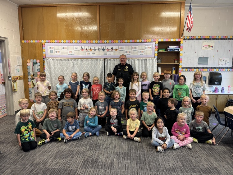 PreK, K, 1 with officer Chin 