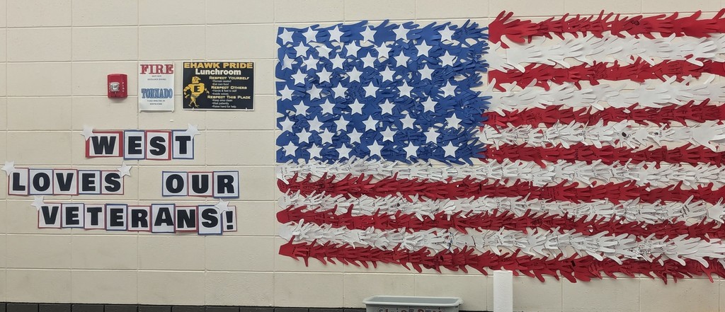 The US flag is made out of all the students hands.