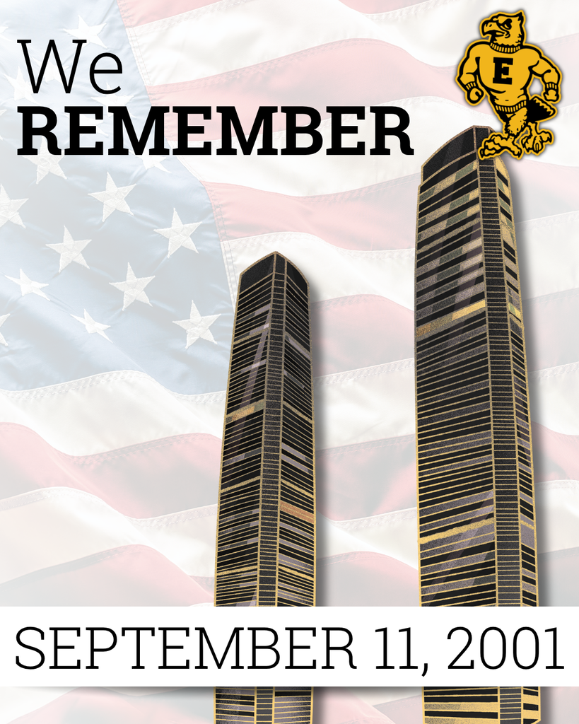 “We Remember” tribute to September 11, 2001, featuring the Twin Towers against a faded American flag.