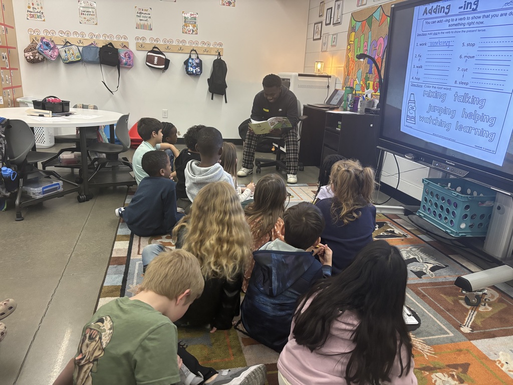 EHS FFA Students Reading to EES Students