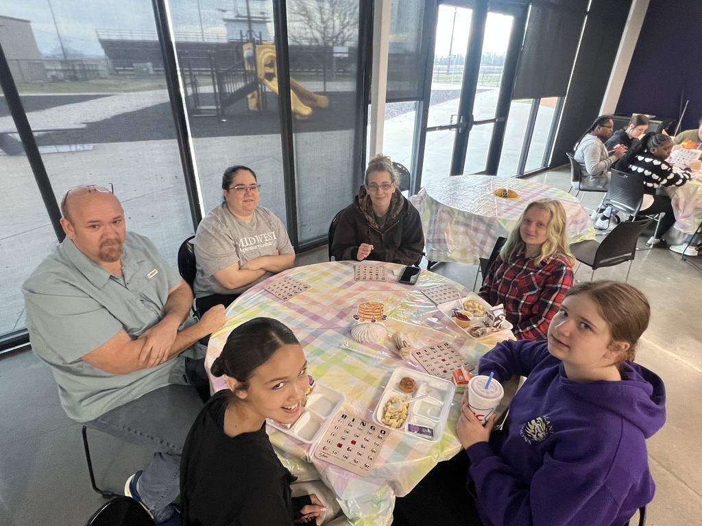 Families Enjoying 6th Grade Breakfast on February 26th