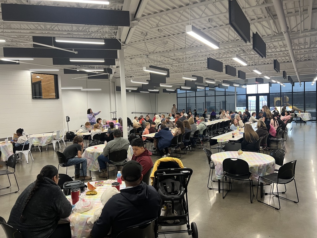 Families Enjoying 6th Grade Breakfast on February 26th