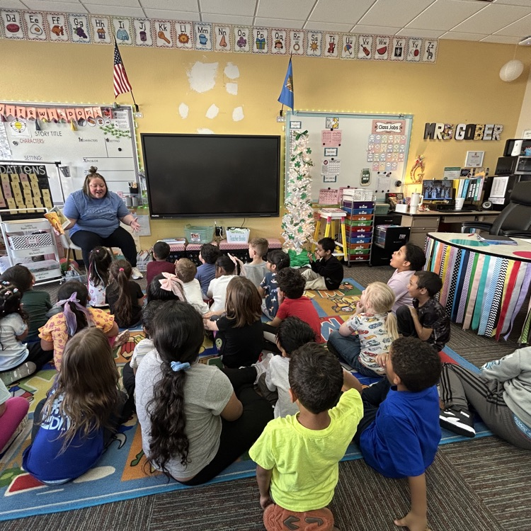 Emily Ellis teaches kinder Lions more about math.
