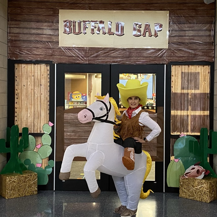 day 1 book fair horse and big hat