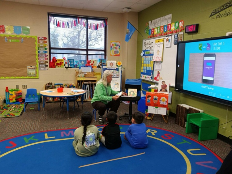 Students listening to a story  