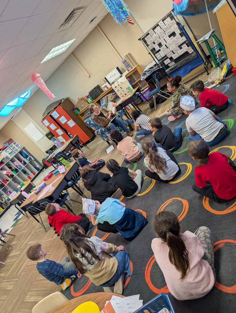 Mrs. Kiner reading to 1st grade