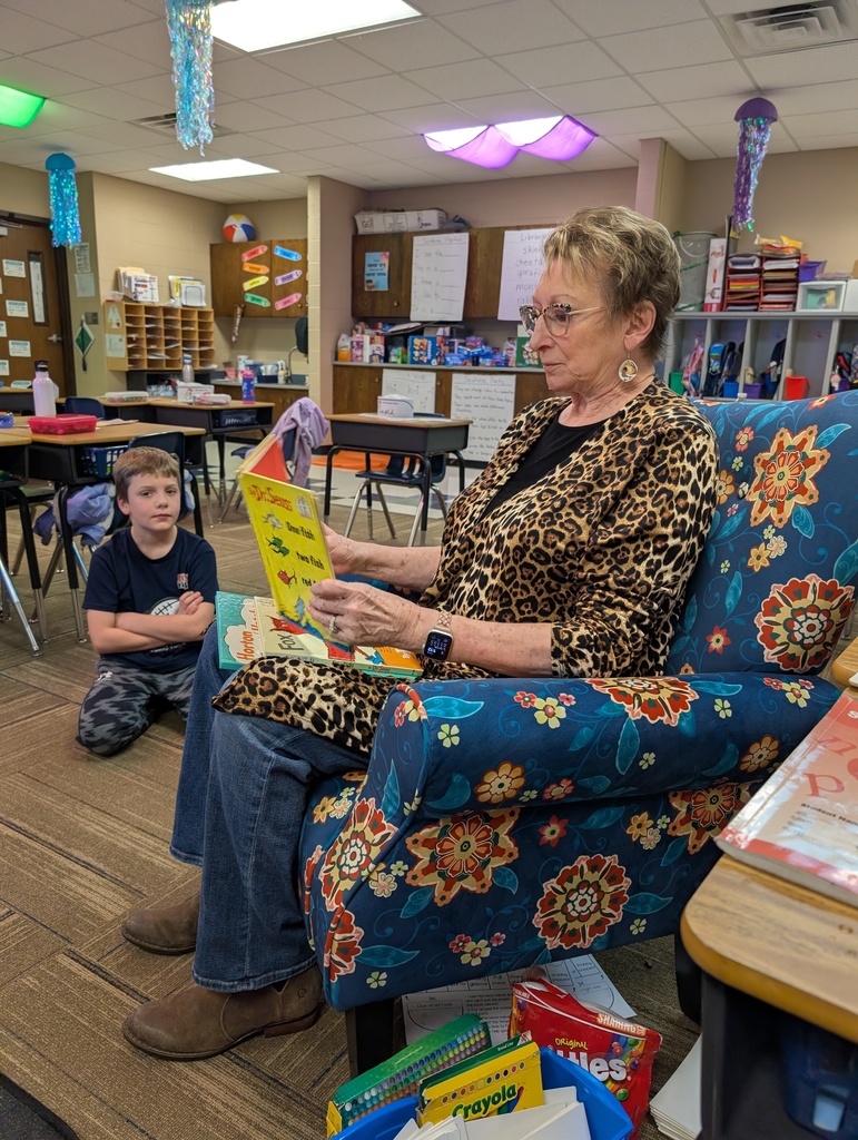 Mrs. Kiner reading to 1st grade