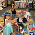 Kinder countdown continues. E for "eruption." F for "friendship bracelets." G for "games." H for "hair" to cut.