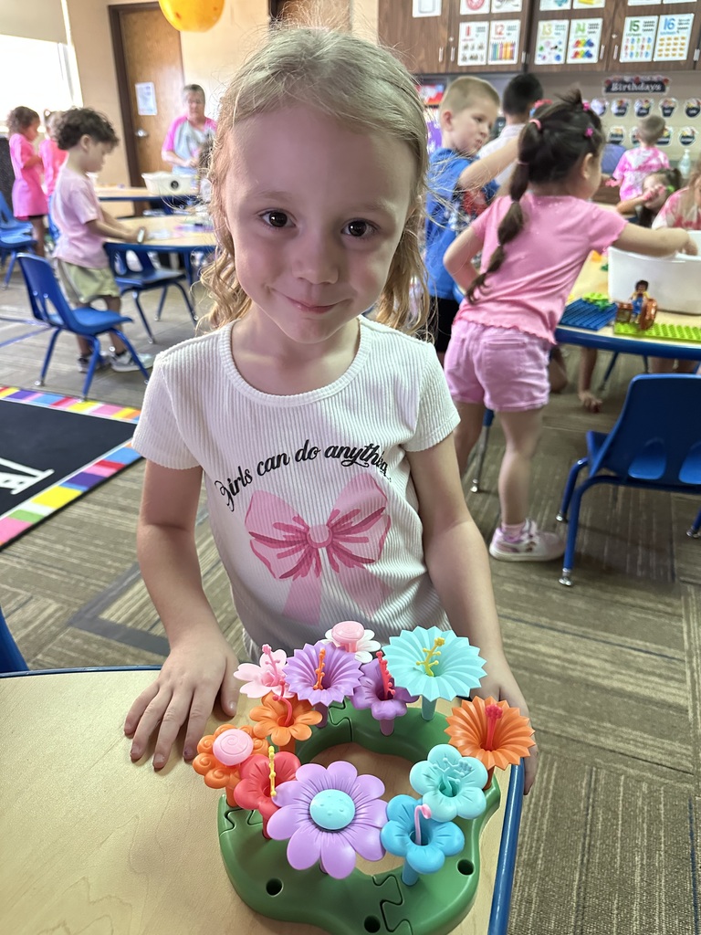 Little girl in pink outfit