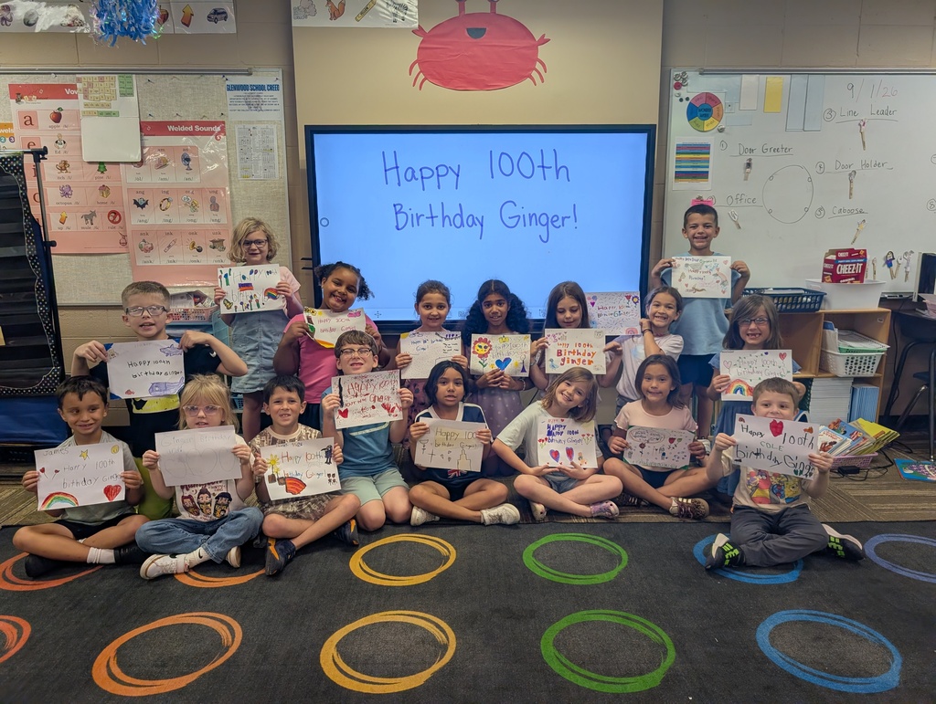 Ms. McCarter's class holding up their cards for Ginger