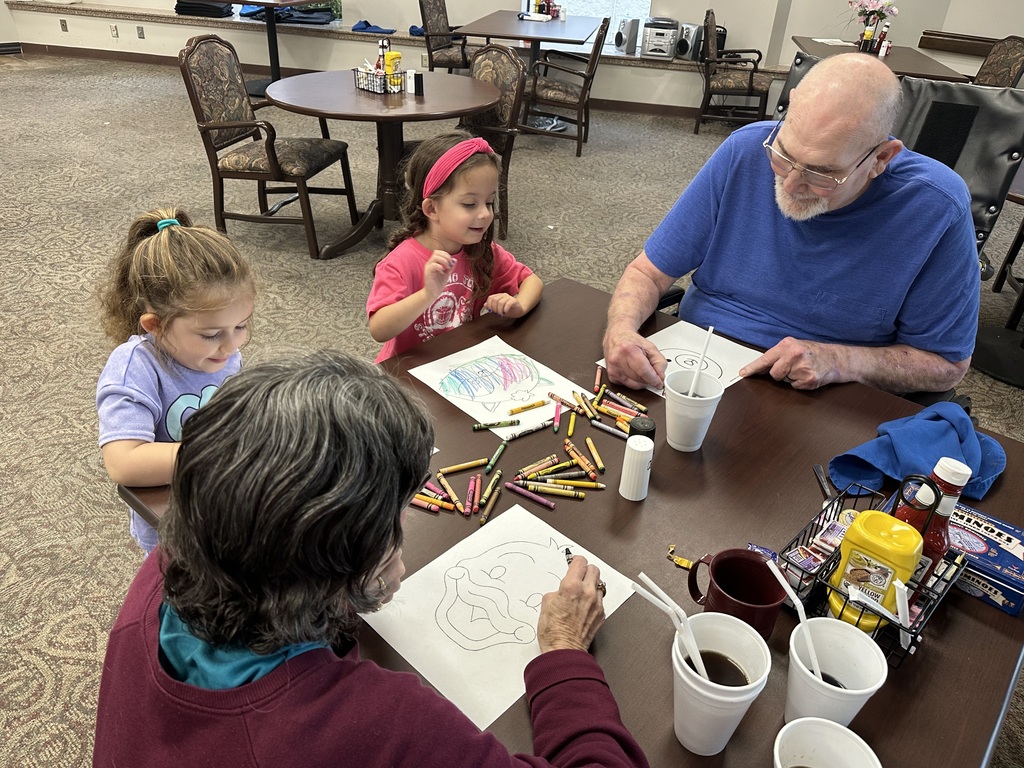 Mrs. Silva's class enjoying activities the elders at the Commons