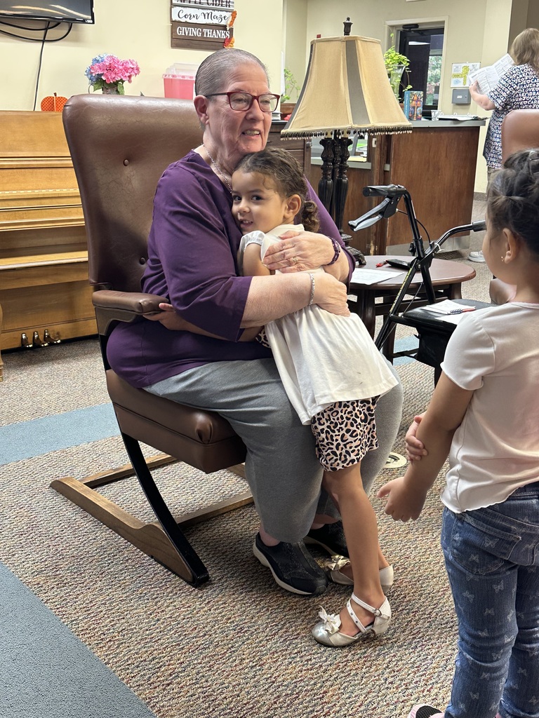 Mrs. Silva's class enjoying activities the elders at the Commons