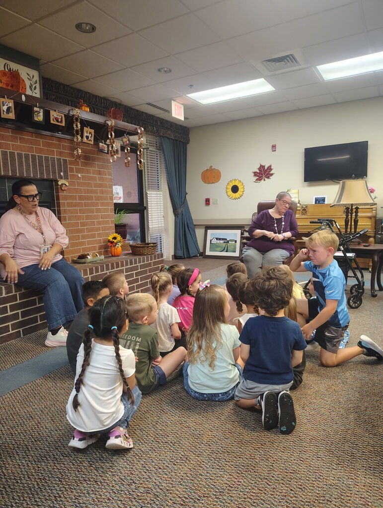 Mrs. Silva's class enjoying activities the elders at the Commons