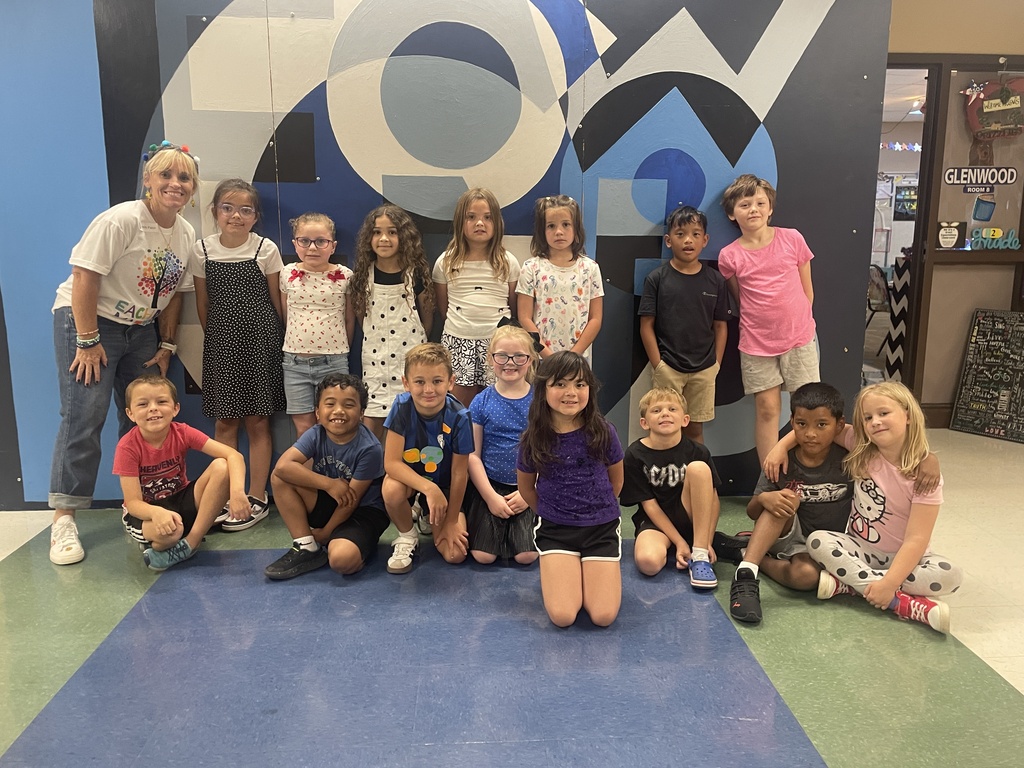 Ms. Day's class posing in their dotted outfits