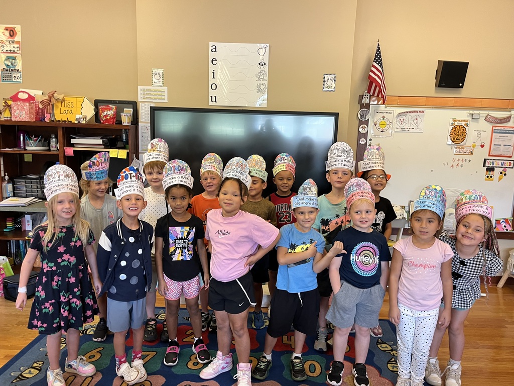 Miss Lara's 1st grade class showing their dot outfits