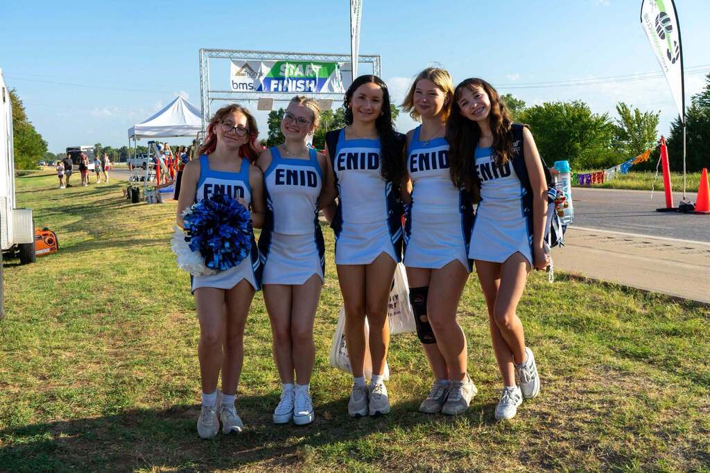 Enid high school pom girls pose for a picture at the great land run race