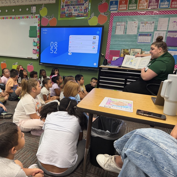 Librarian Sam Hopkins helped Monroe firsties become (Wit &) WISER about how libraries work.💛🦁💙