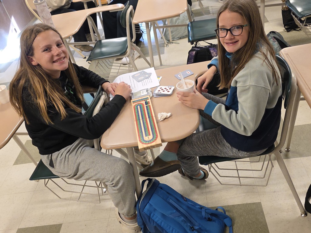 Learning how to play cribbage.