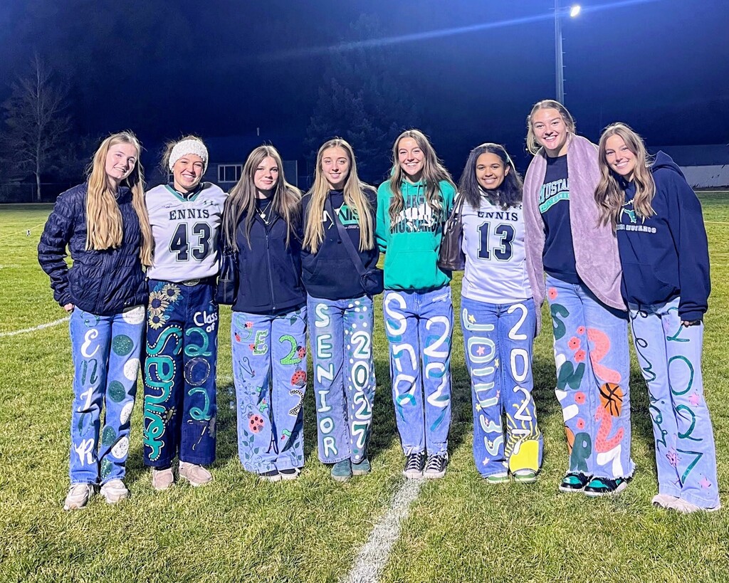 Senior ladies showing of their Senior Jeans