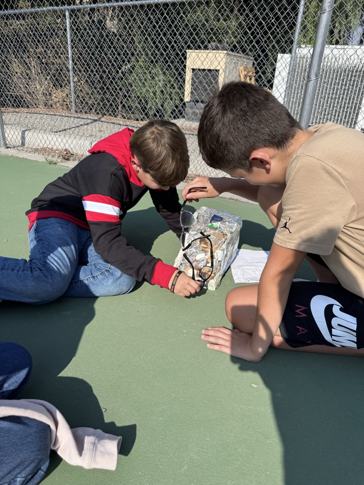 Eli and Diego getting creative concentrating light rays