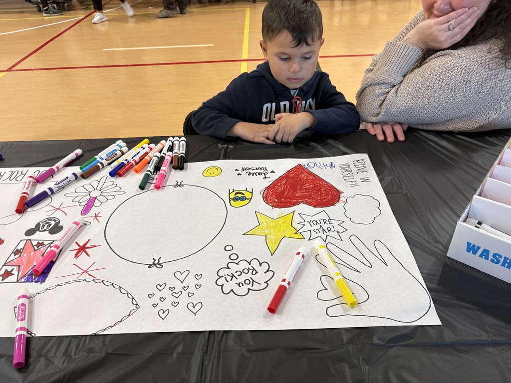 Student participating in PTO Art Night