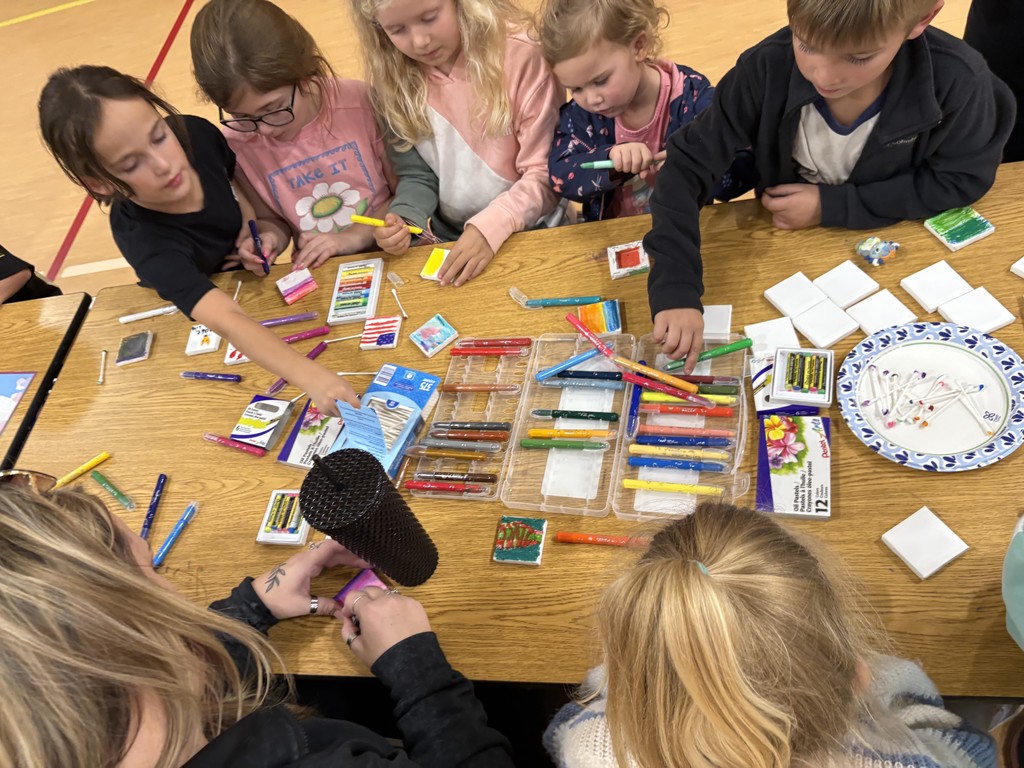 Student participating in PTO Art Night