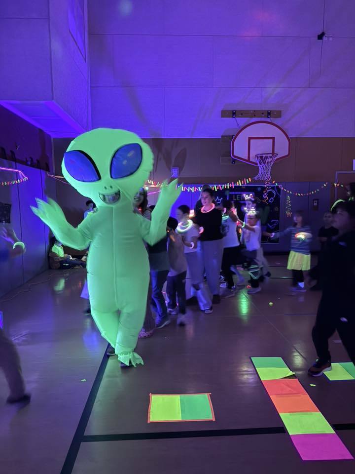 Ms. Glow having a great time at the dance.