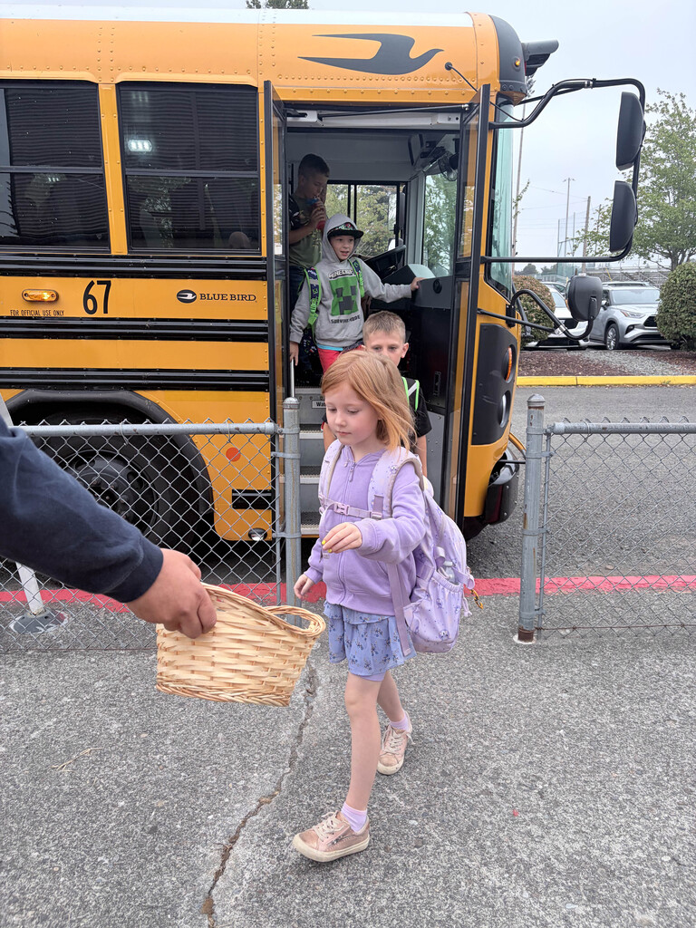 Girl getting off bus