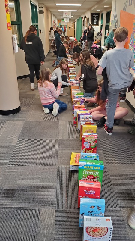 setting up cereal box dominoes